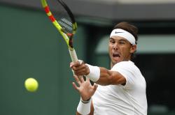 雷速体育网页版-法网横扫温网，纳达尔状态火热